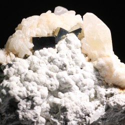 Calcita con pirita y sericita